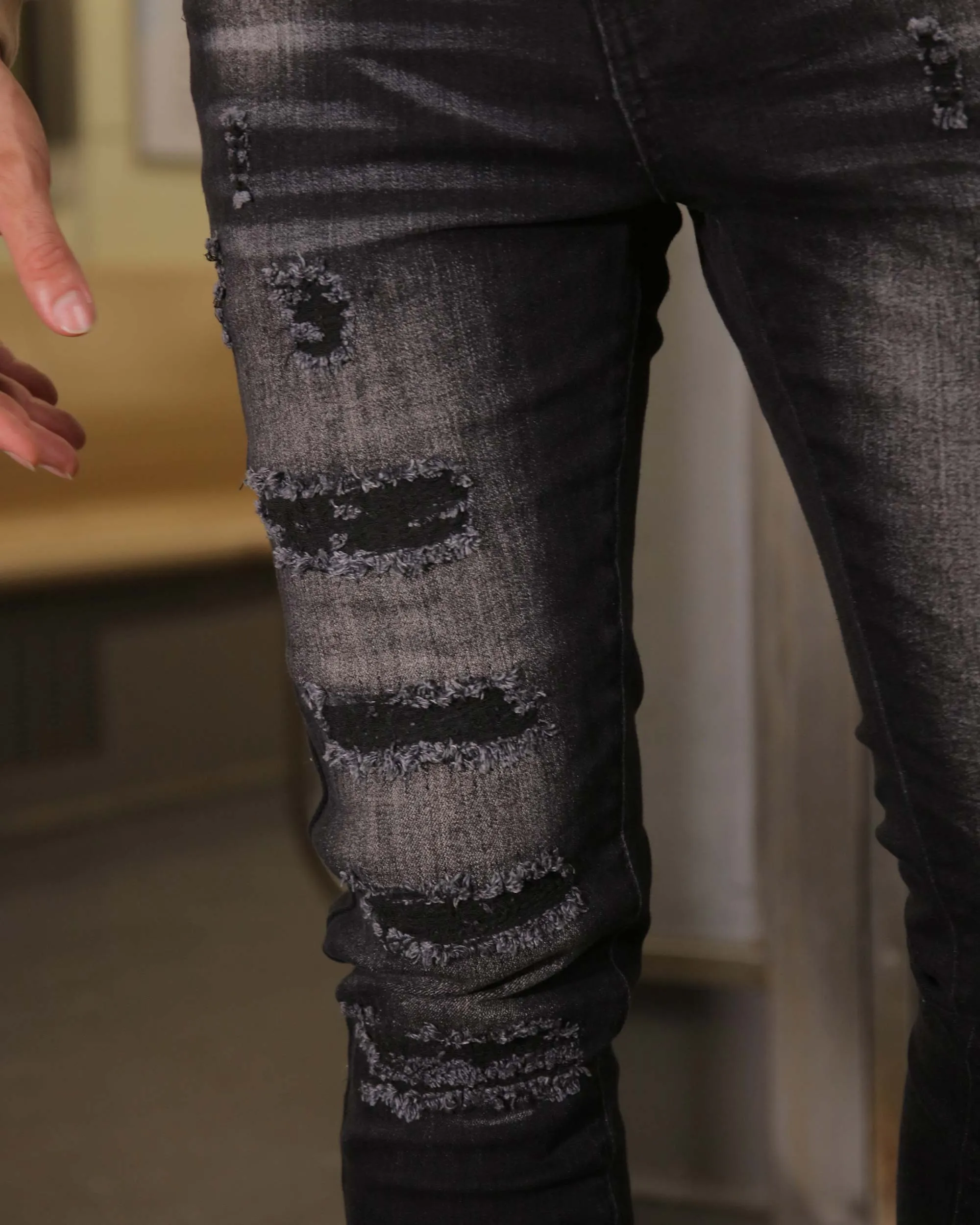 Distressed Black Ripped Jeans with Streetwear Appeal