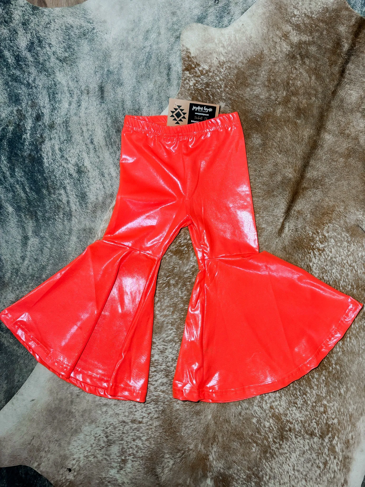 Kids neon orange leather bell bottoms